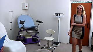 Pretty Leggy Blonde Undresses In Gyno..