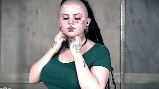 Tattooed goth Luna LaVey is restrained..