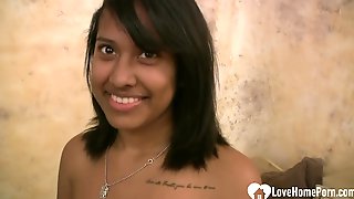 Seductive dark hair Indian teen blowing..